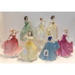 Seven Royal Doulton figures including Flower of Love, Jennifer, Emma, Ellen, Madeline, Aurora and