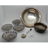 A lot comprising a silver plated bowl, a Burmese white metal bowl, a white metal spoon and four