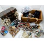 Two boxes full of vintage costume jewellery Condition Report: Not available for this lot