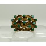 An Arabic gold turquoise set ring, size L1/2, weight 4gms Condition Report: Available upon request