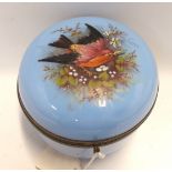 A Victorian pale blue glass hinged pot and cover, the lid painted in enamels with a bird amongst