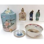 A Japanese pot and cover with textured surface, a porcelain tea caddy (af) two oriental figures, a