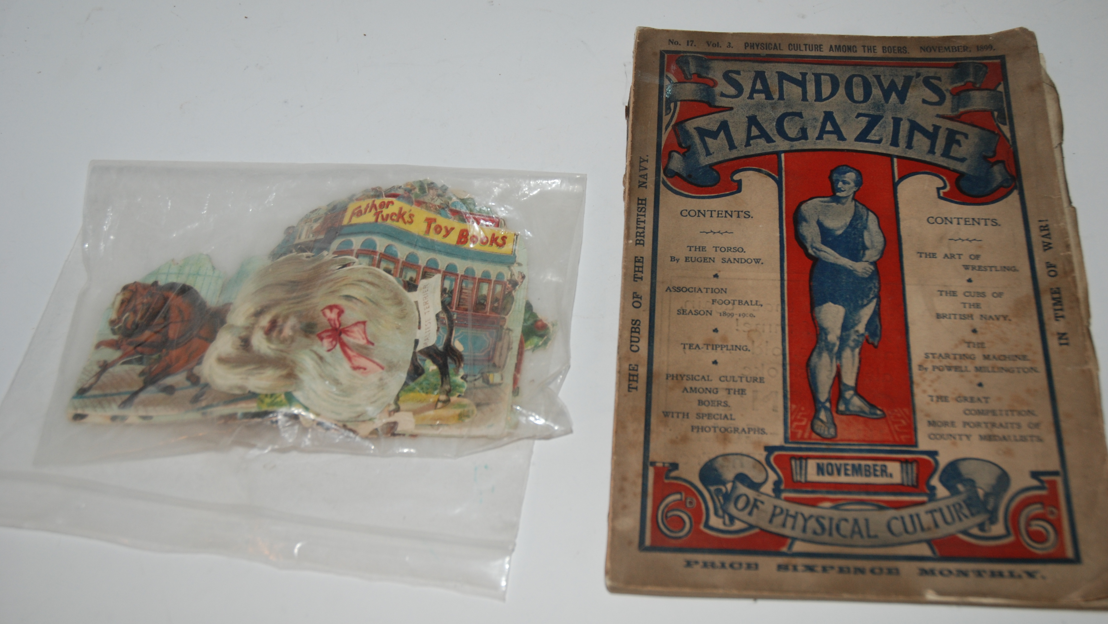 A Sandow's Magazine, 1899, white-metal trophy, banknotes etc Condition Report: Available upon