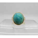 An 18ct gold turquoise set ring, size M, weight 6.3gms Condition Report: Available upon request