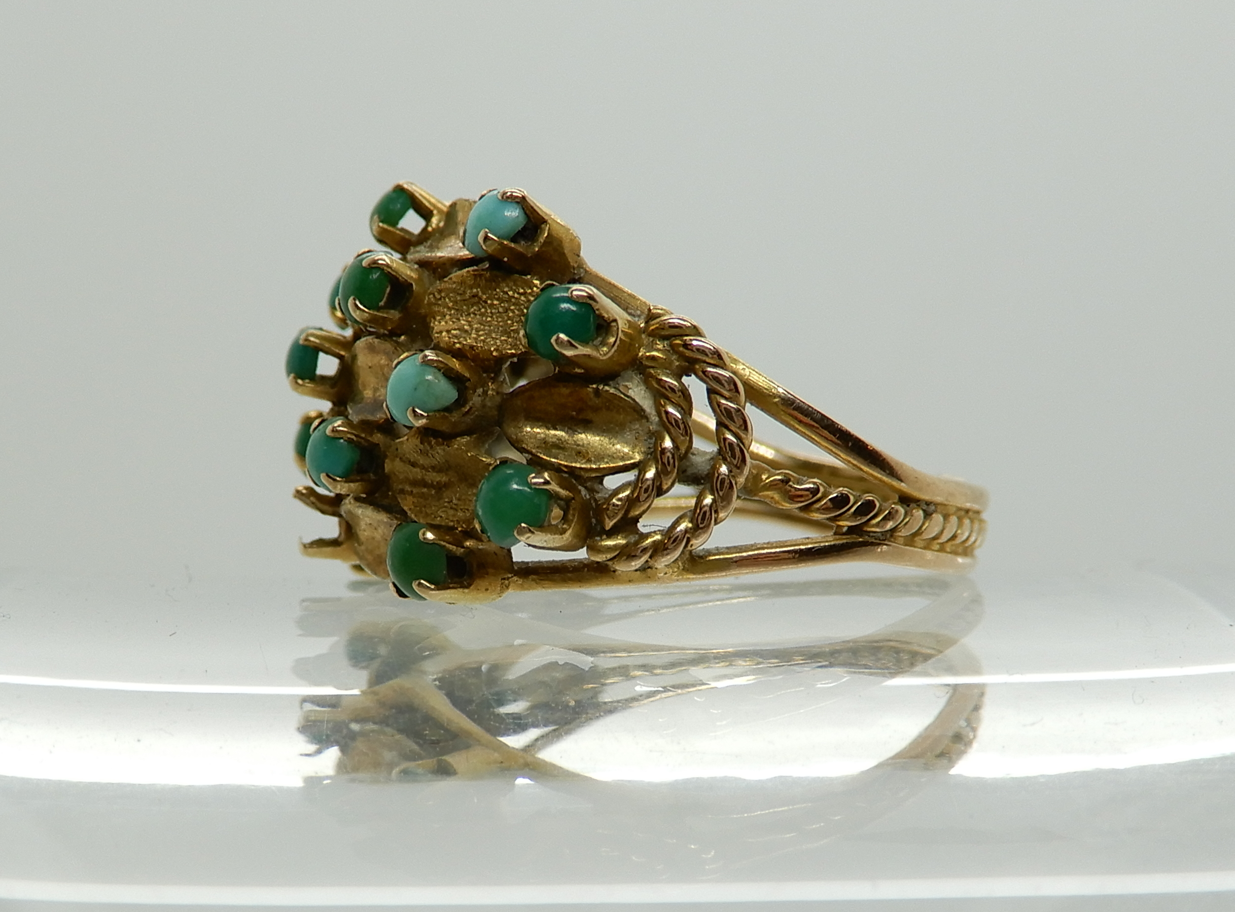 An Arabic gold turquoise set ring, size L1/2, weight 4gms Condition Report: Available upon request - Image 3 of 3