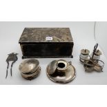 A box of scrap silver, cigarette box, inkwell, cruet stand etc Condition Report: Available upon