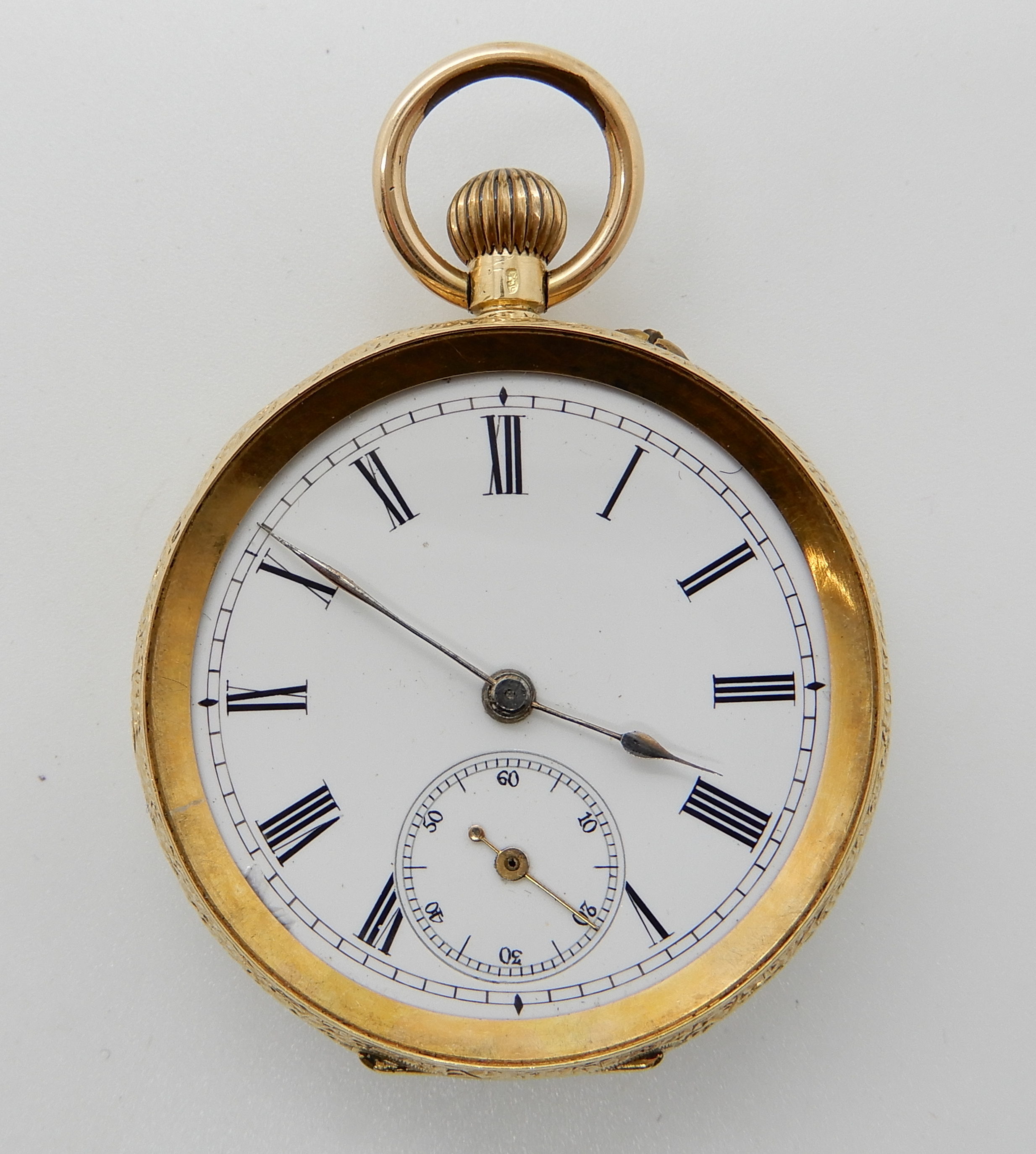 An 18ct gold open face pocket watch (glass missing) diameter 3.6cm, weight including metal dust