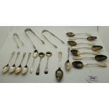 A lot comprising assorted silver teaspoons and three pair of silver sugar tongs, 368gms Condition