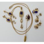 A 9ct gold Glasgow girls design lapis lazuli set pendant and earrings, 9ct lapis lazuli studs and