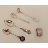 A lot comprising a silver vesta, a silver mustard spoon, a teaspoon and two coffee spoons,