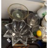 A collection of glassware including a pair of wheat etched tumblers, a star shaped bowl, tall