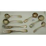A lot comprising two silver sauce ladles, London 1831 and 1837, two sifter ladles, another sauce