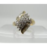 A diamond cluster ring of estimated approx 0.40cts combined, size M1/2, weight 4.1gms Condition