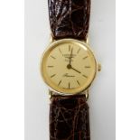 A ladies 9ct gold Longines quartz Presence, with a brown crocodile strap Condition Report: Available
