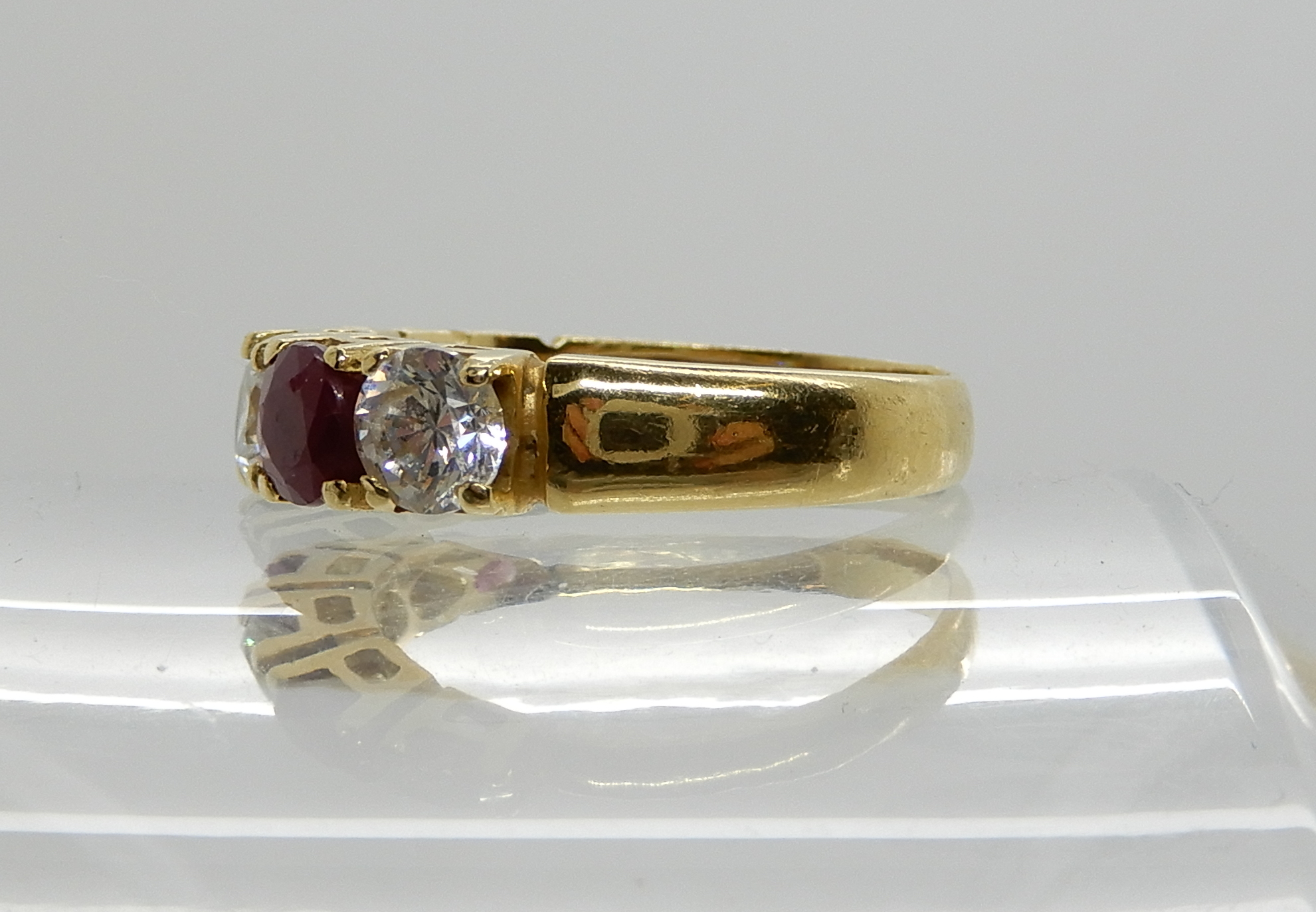 A continental bright yellow metal ruby and clear gem ring, size P, weight 5gms Condition Report: - Image 3 of 3