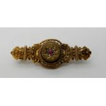 A 15ct gold red gem and rose cut diamond brooch, length 4.7gms, weight 5.4gms Condition Report: