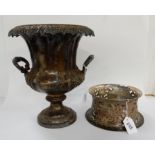 A lot comprising a white metal campagna shaped wine cooler and a silver plated dish ring (2)m 28cm