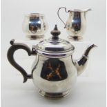 A bachelors three piece silver tea service by Horace Woodward & Co, Birmingham 1921 (3), 380gms