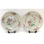 A pair of Famille Rose plates decorated with chrysanthemums, 23.5cm diameter Condition Report: