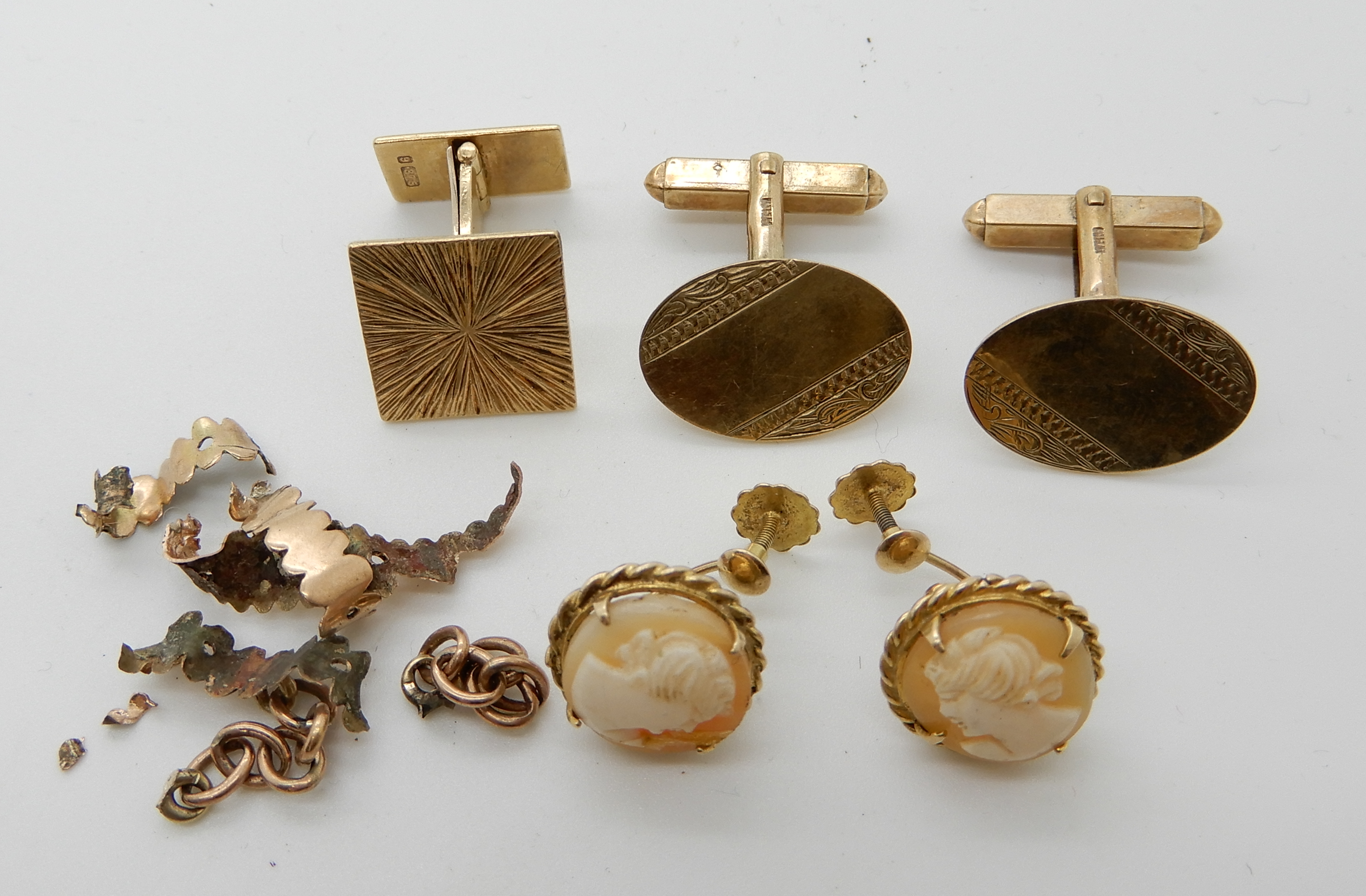 A pair of 9ct gold cufflinks, 9ct cameo earrings and other items of gold and yellow metal,