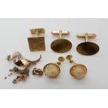 A pair of 9ct gold cufflinks, 9ct cameo earrings and other items of gold and yellow metal,