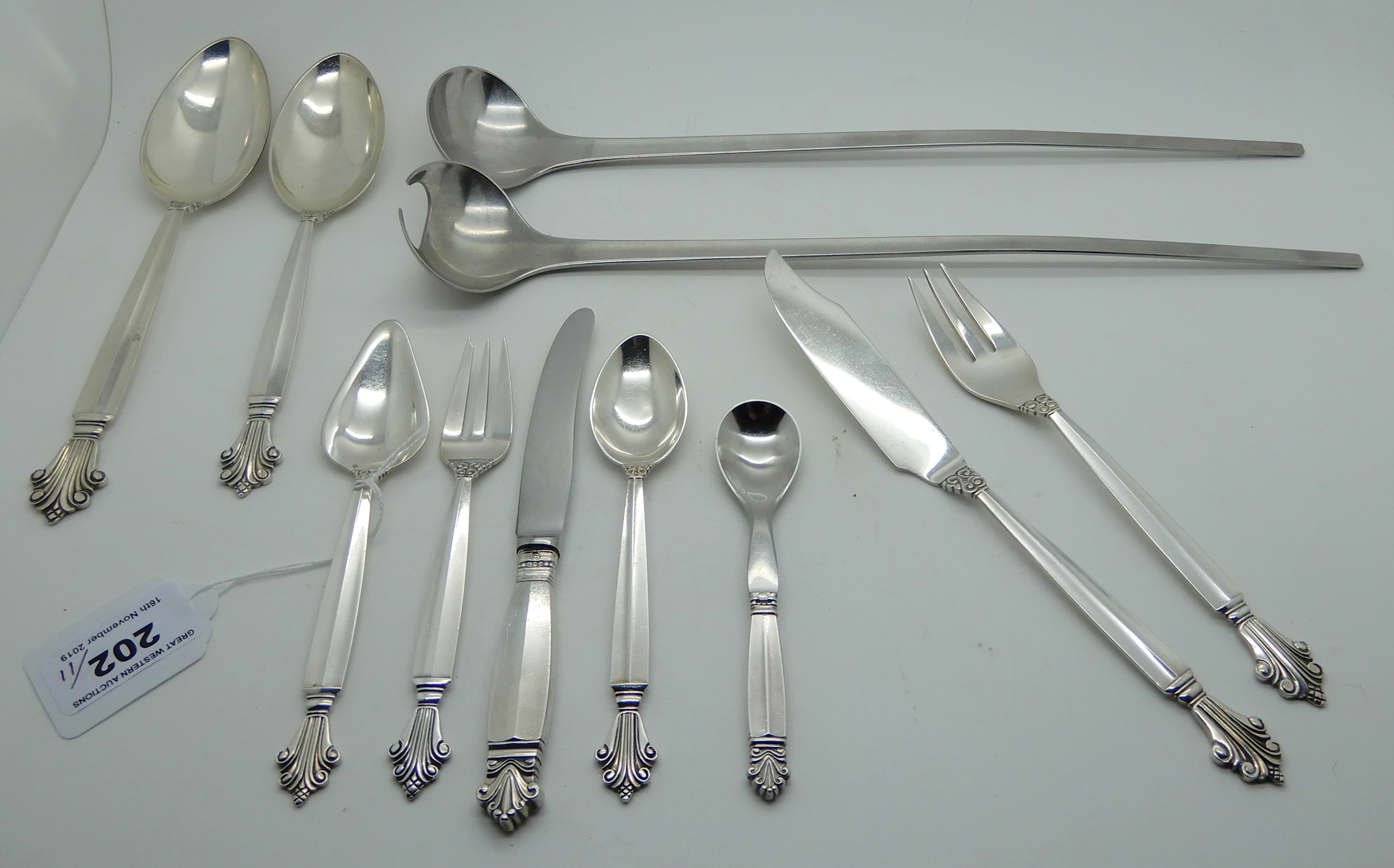 A lot comprising a part set of Georg Jensen sterling silver cutlery comprising a pair of