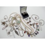 A collection of silver and costume jewellery to include bangle, chains earrings etc Condition