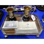 A lot comprising two small silver trophy cups, a set of Maritime playing cards, a Maritime postcard,
