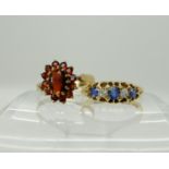 An 18ct gold sapphire and diamond ring size P, weight 3gms, together with a 9ct gold garnet