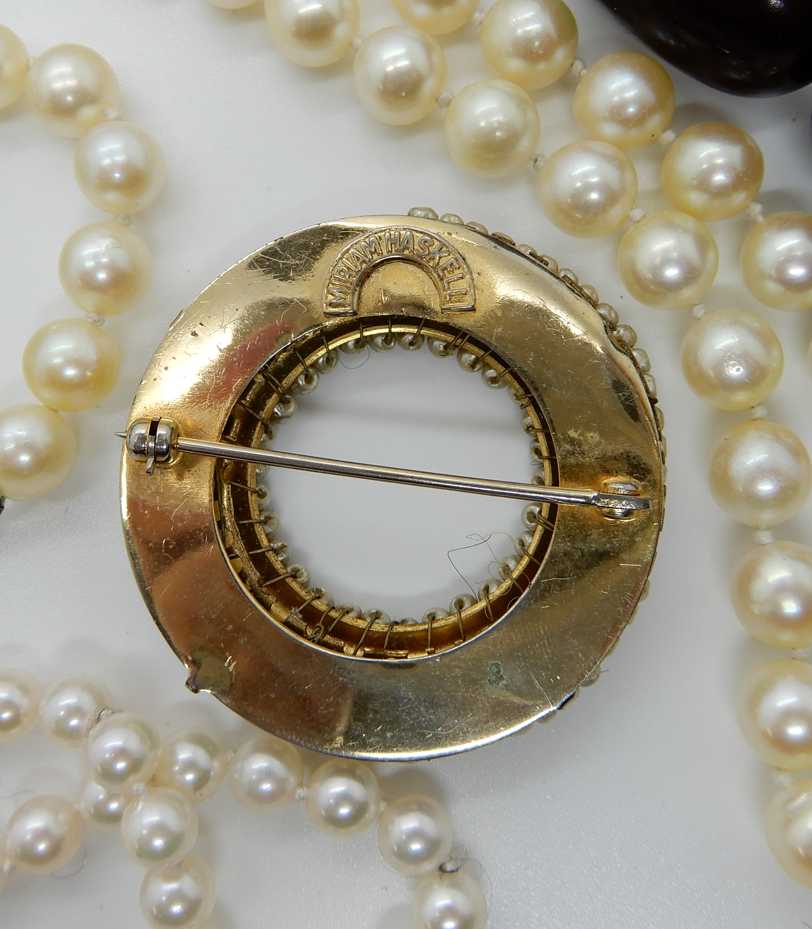 Two strings of pearls one with a 18ct clasp the other 9ct, a Miriam Haskell brooch, a Chinese - Image 2 of 3