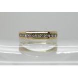 A 9ct gold diamond set eternity ring, set with estimate approx 0.20cts of brilliant cut diamonds