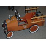 A Great Gizmos Ltd child's toy pedal truck, 94cm wide Condition Report: Available upon request