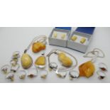 A collection of silver jewellery set with amber Condition Report: Not available for this lot