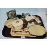 A tray lot including hand brushes, candlesticks, travel clock etc Condition Report: Available upon