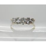 A bright yellow metal five stone diamond ring of estimated approx 0.45cts combined, size L1/2,