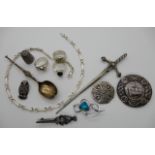 A Robert Allison silver letter opener and two brooches, a John Hart Iona thistle brooch, a silver