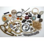 A collection of Victorian and other vintage jewellery to include locket chains, jet snake