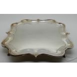 A silver card tray by Elkington & Company Limited, Birmingham 1903, 23cm square with scalloped