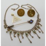 An 18ct gold triangular pendant and two bright yellow metal shirt studs weight 8gms, a yellow