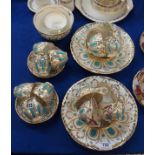 A Coalport part tea and coffee service, the white ground with turquoise and gilt decoration