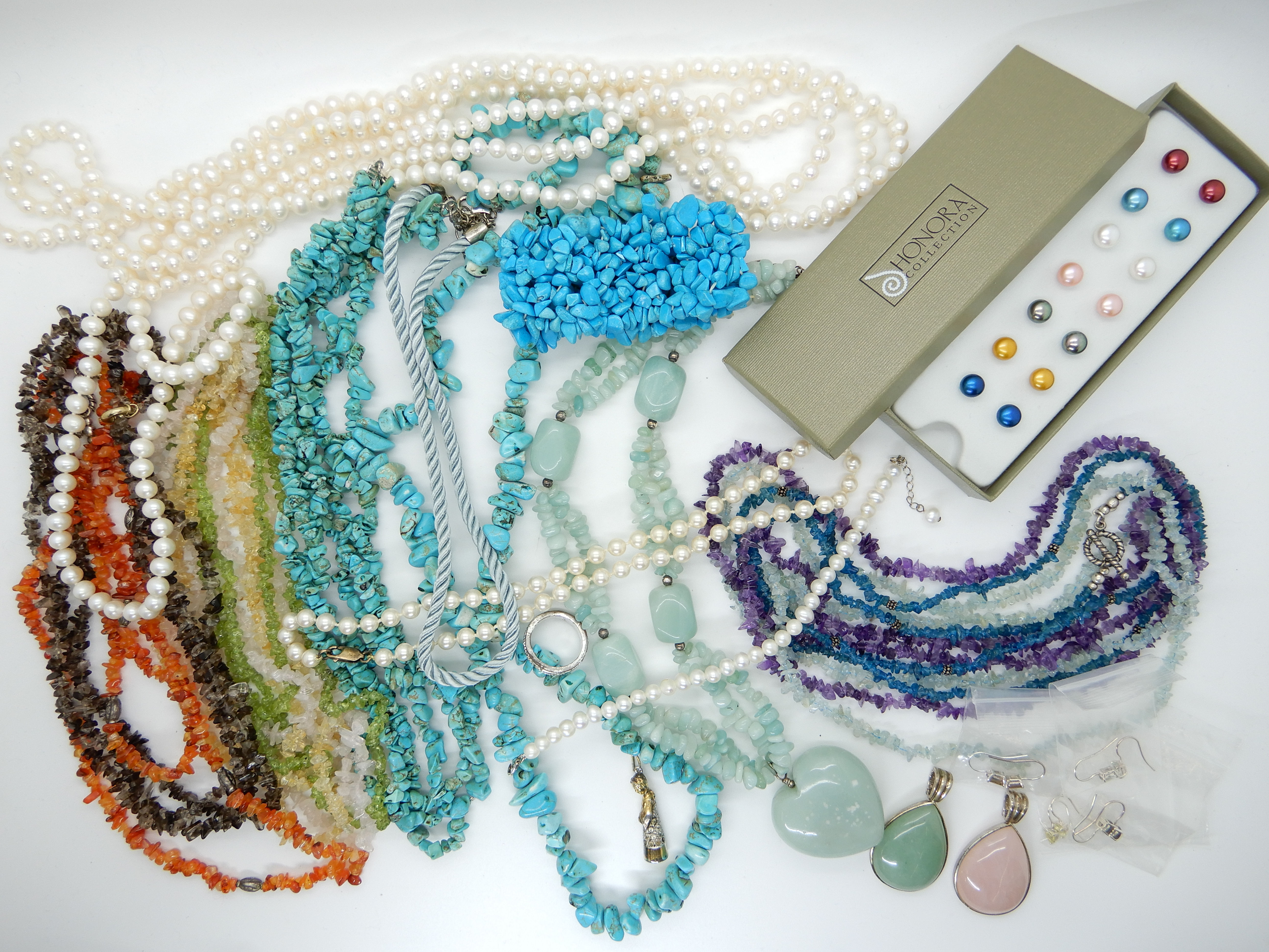 A collection of Honora cultured pearls, gemstone necklaces to include peridot, citrine, amethyst,