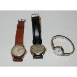 A Borel gents wristwatch, a Trebex gents wristwatch and a ladies wristwatch (3) Condition Report: