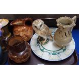 A Beswick figure of a barn owl, a stoneware puzzle jug, a stoneware hunting dated 1868 and other