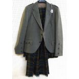 A gent's kilt with matching plaid, another gent's kilt, a child's example, jackets, black trousers