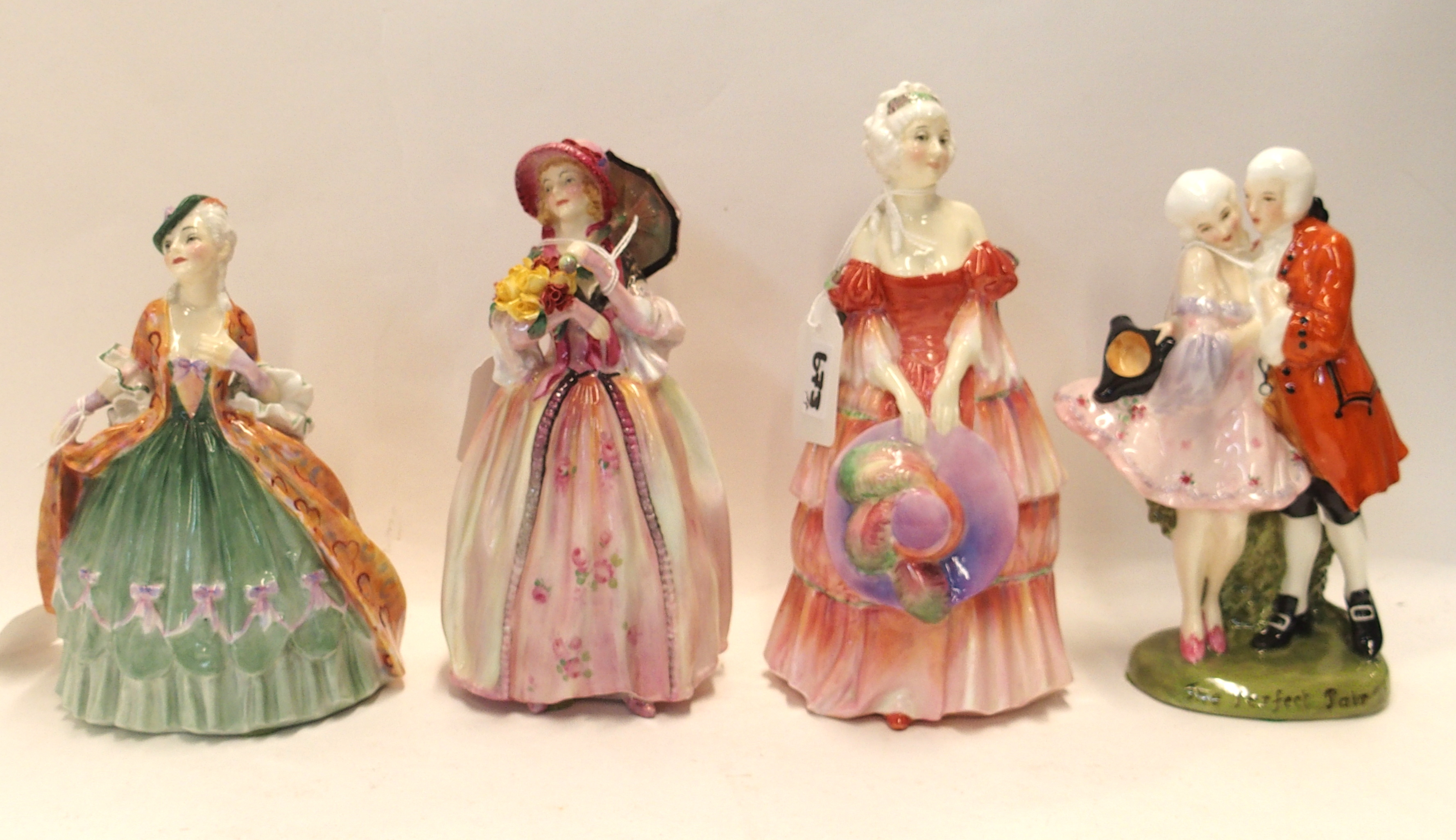 Four Royal Doulton figures including The Perfect Pair, Veronica HN1517, June HN1691 and Sibell