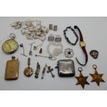 A lot comprising WWII France and Germany star, Atlantic star, a military pocket watch, a silver