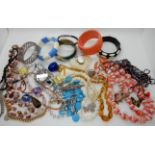 Vintage costume jewellery to include a micro mosaic brooch, coral beads and a large cat brooch