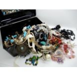 A box full of vintage costume jewellery Condition Report: Not available for this lot