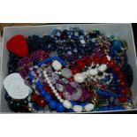 Two boxes of costume jewellery including beads etc Condition Report: Available upon request