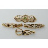 A 9ct gold peridot brooch, length 4.5cm, two 9ct opal set brooches and a 9ct sapphire example